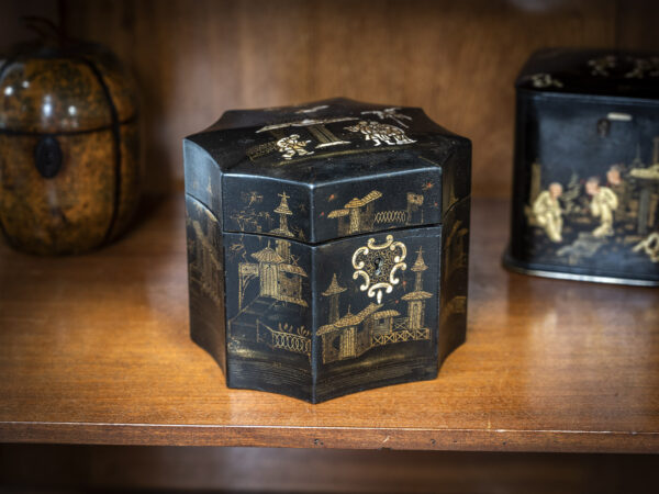 Chinese style tea caddy on a shelf