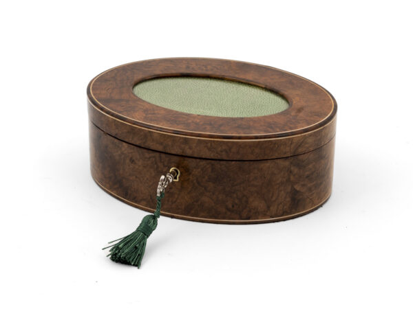 Walnut and shagreen oval box with key