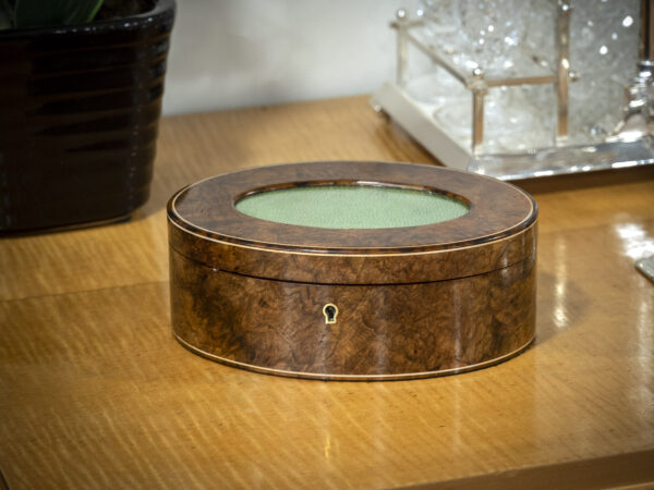 Walnut and shagreen oval box on side