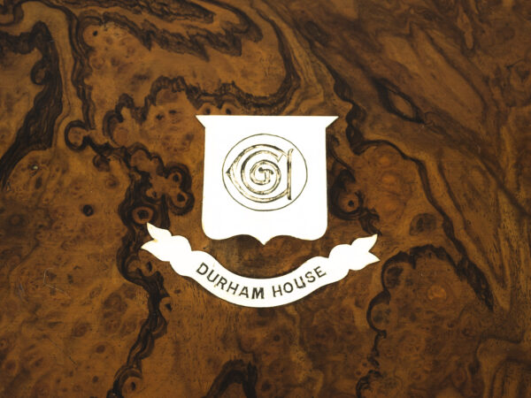 Close up of the Durham house emblem