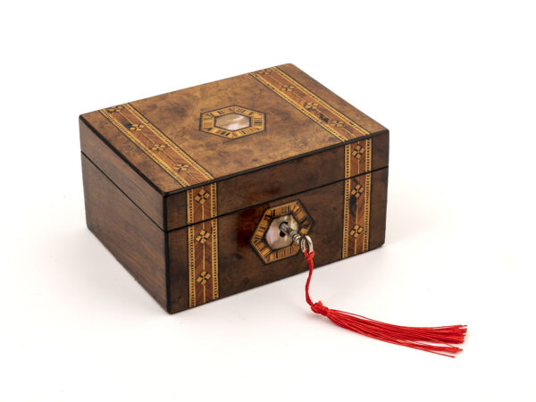 small walnut jewellery box with key