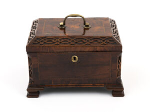 Antique tea chest on white background