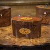 oval tea caddy on display table