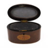 oval tea caddy open