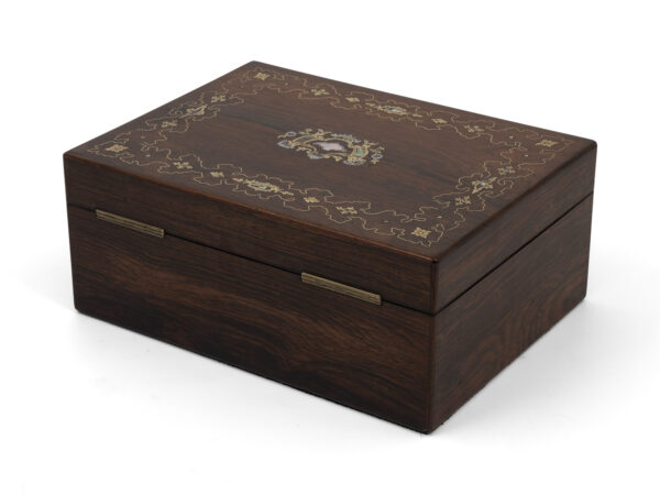 rosewood jewellery box on white background