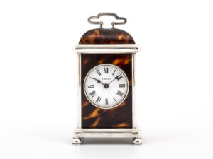 tortoiseshell and silver mantel clock