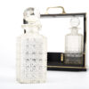 antique tantalus decanter close up