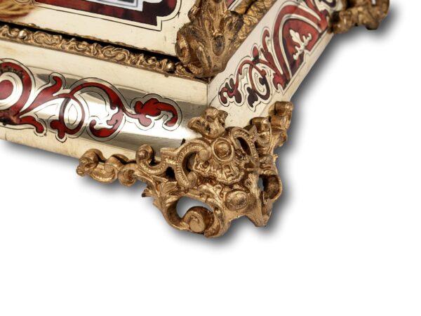 close up of the ormolu scrollwork feet