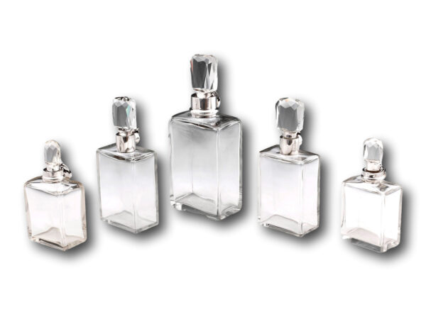 Overview of five decanter bottle set by hukin and heath