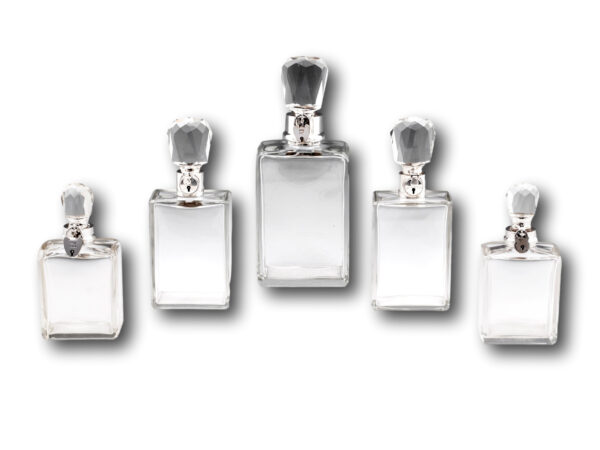 Overview of five decanter bottle set by hukin and heath