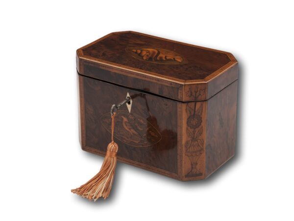 Overview of the Georgian Burr Yew Tea Caddy with the key inserted