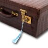 Close up of the Art Deco Crocodile Luggage Case with the key inserted