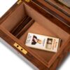 Humidor in a decorative setting with fitted cigars