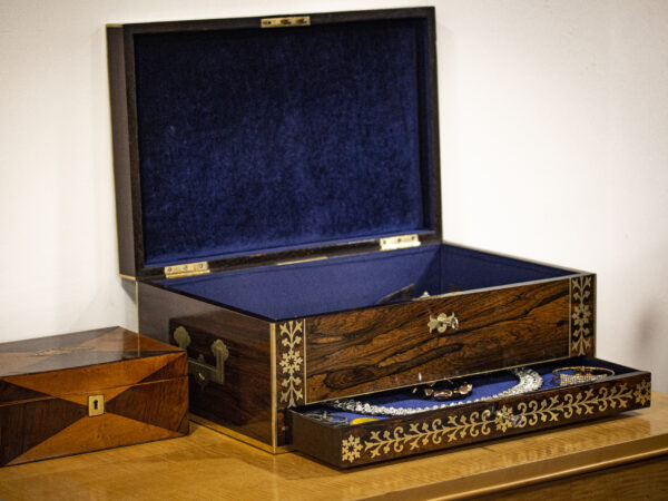 Rosewood box in a decorative collectors setting