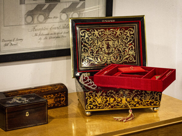 View of the French boulle jewellery box in a decorative collectors setting