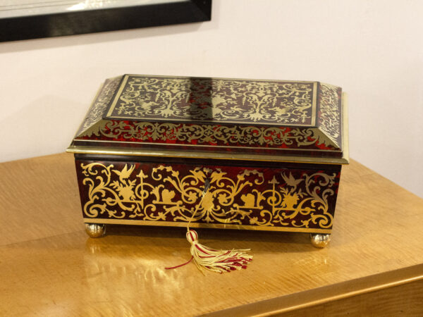 View of the French boulle jewellery box in a decorative collectors setting