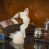 Rene Lalique Vitesse in a decorative collectors setting