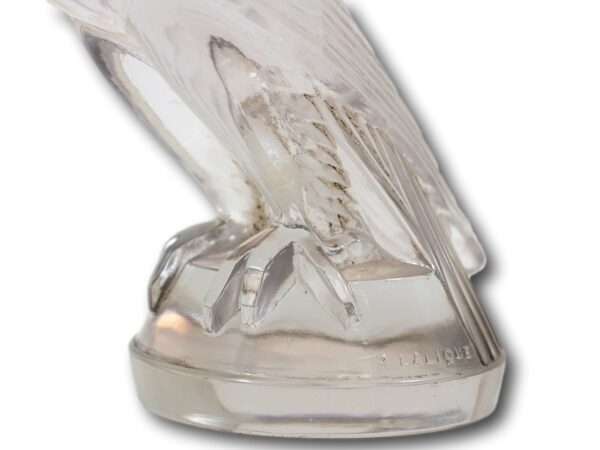 Close up of the feet of the Falcon Rene Lalique car mascot
