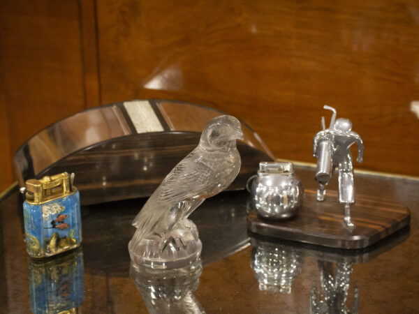 Rene Lalique Falcon car mascot in a decorative setting