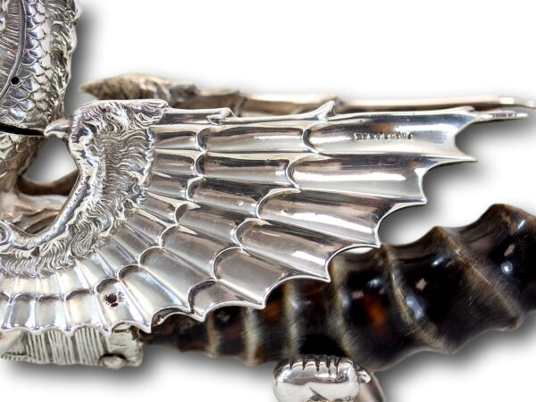Close up of the wing of the Military Mess Dragon Table Lighter