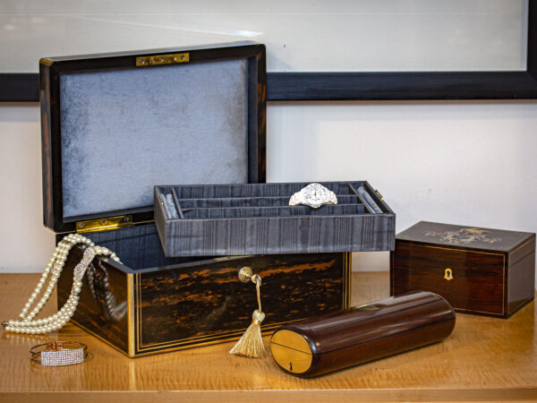 Calamander Jewellery Box in a decorative collectors setting to view the scale