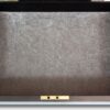 Close up of the storage compartment below the top tray