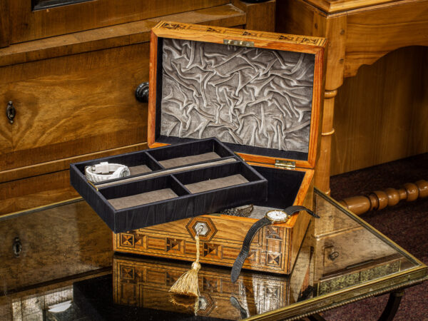 Geometric Jewellery box in a decorative collectors setting for scale