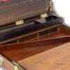 View of the secret compartment containing three drawers