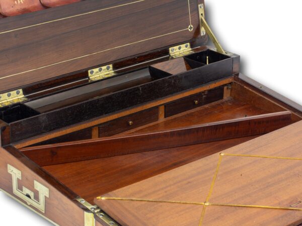 View of the secret compartment containing three drawers