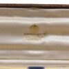 Close up of the Asprey Retailers mark