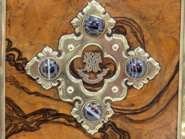 Close up of the monogram and agate brass mount