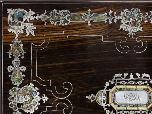 Close up of the intricate mother of pearl and abalone decoration