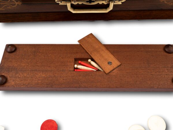 Close up of the hidden cribbage pins storage