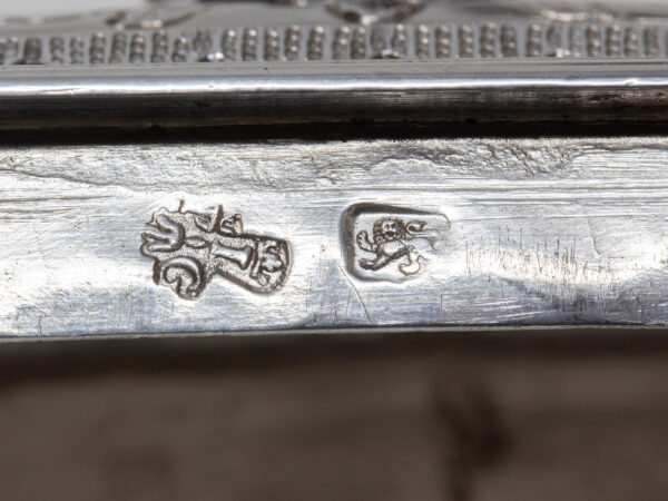 Close up of the sterling silver hallmarks on the lid for London Pierre gillois