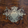 Close up of the initial plaque on the lid