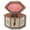 Overview of the Paper Scroll tea caddy with the lid up and floating lids showing