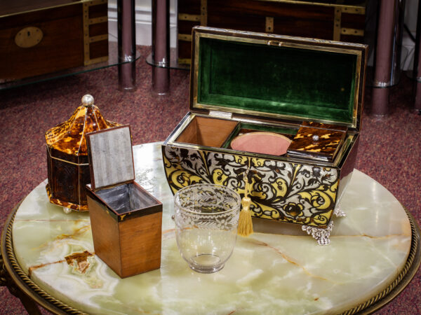 Regency Tortoiseshell Tea Chest in a decorative collectors setting to view the scale