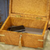 Overview of the Birdseye Maple Jewellery Box in a decorative setting with a laptop and phone placed inside