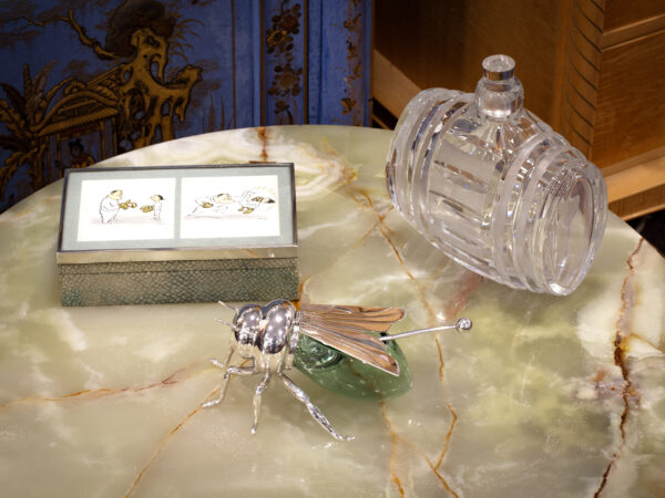 Overview of the Mappin Webb Honey Bee in a decorative collectors setting