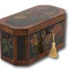 Overview of the painted tea caddy with the key inserted