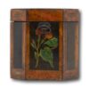 Sidea of the painted tea caddy