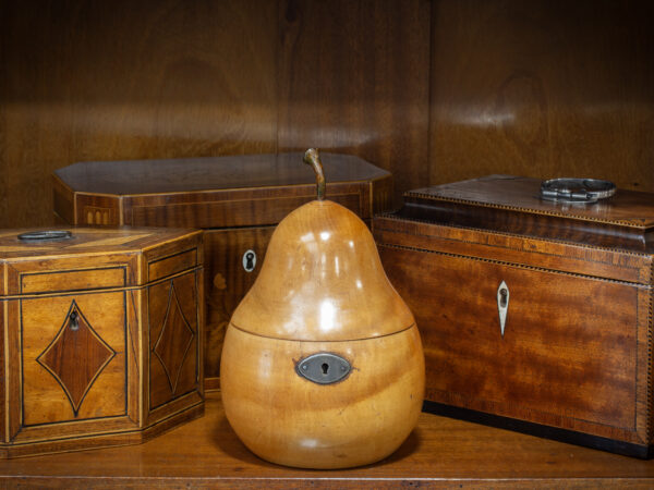 Overview of the Pear Fruit Tea Caddy in a decorative collectors setting