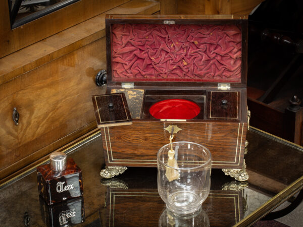 Overview of the Rosewood Tea Caddy in a decorative collectors setting