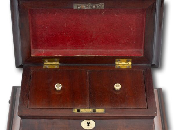 Overview of the mahogany tea caddy with the lid up and tea caddy lids shown