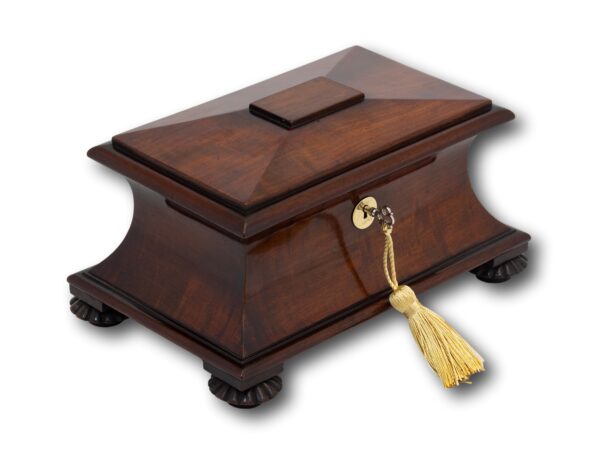 Overview of the mahogany tea caddy with the key fitted