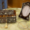 Overview of the Regency Tortoiseshell and Mother of Pearl Jewellery Box in a decorative collectors setting