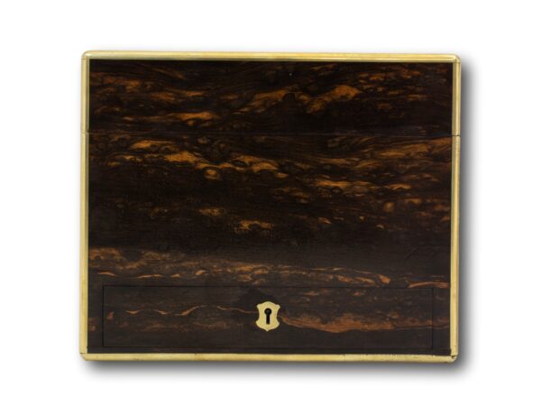 Side of the Lund Coromandel Vanity Box showing the hidden drawer escutcheon
