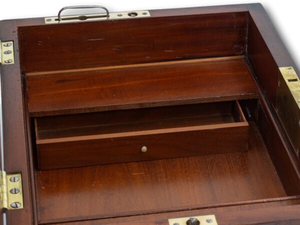 View of the draw open in the first hidden compartment