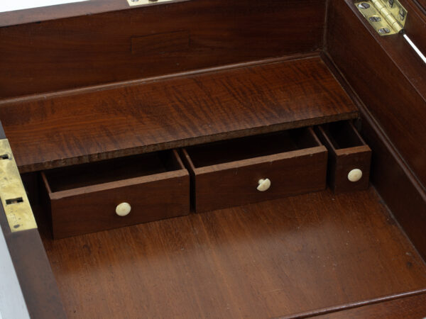 View of the drawers opening in the second hidden compartment