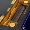 Close up of the satinwood partitions, inkwell and pen tray to the rear